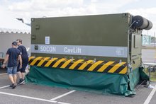 Booth of the project partner company Socon with the cavern elevator and information about the project